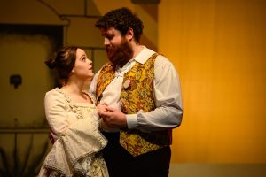 Casilda and Luiz share an embrace